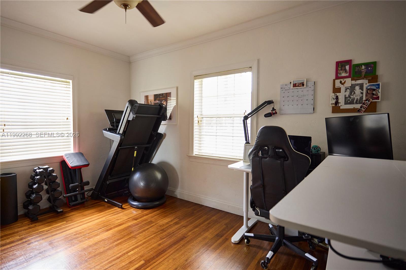 5755 Devonshire Boulevard, Unit 5755 Miami, FL 33155 - Photo 22 of 30 a room with furniture and wooden floor