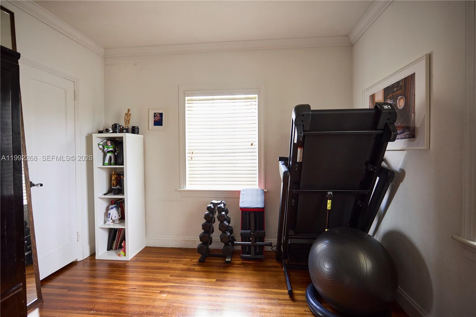 5755 Devonshire Boulevard, Unit 5755 Miami, FL 33155 - Photo 23 of 30 a view of a livingroom with furniture and a window