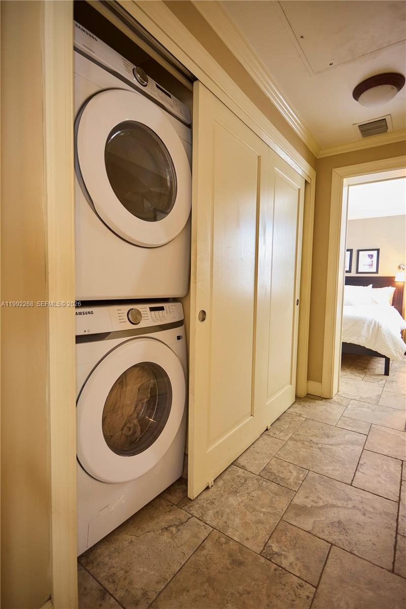 5755 Devonshire Boulevard, Unit 5755 Miami, FL 33155 - Photo 24 of 30 a view of a hallway with washer and dryer