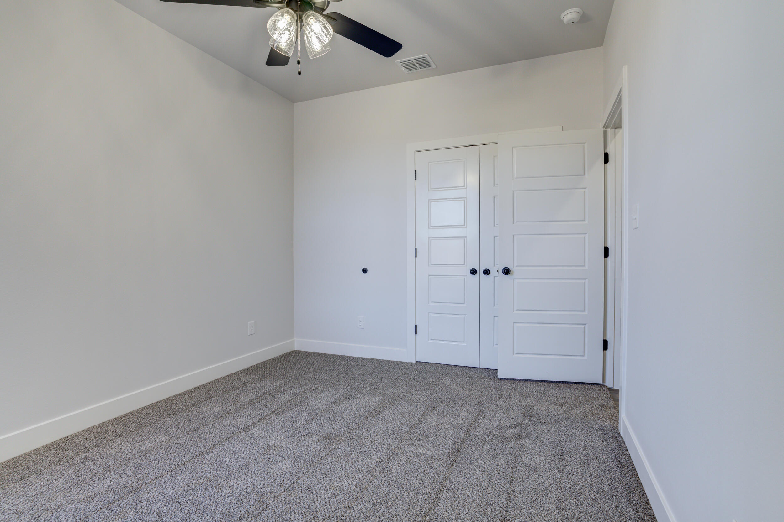 1005 Quincy Avenue Lubbock, TX 79416 - Photo 15 of 46 a view of room with chandelier fan