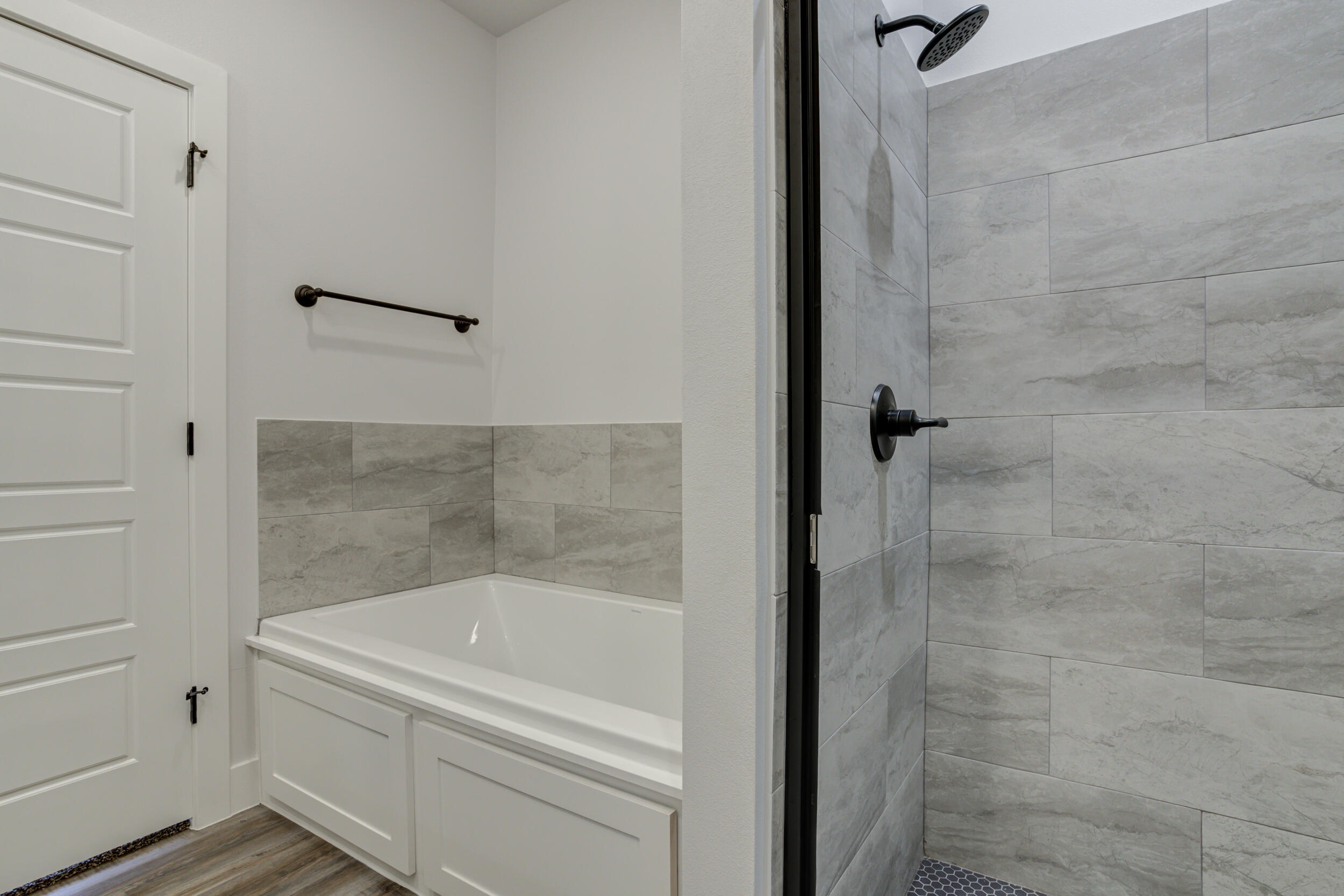 1005 Quincy Avenue Lubbock, TX 79416 - Photo 41 of 46 a bathroom with a bathtub