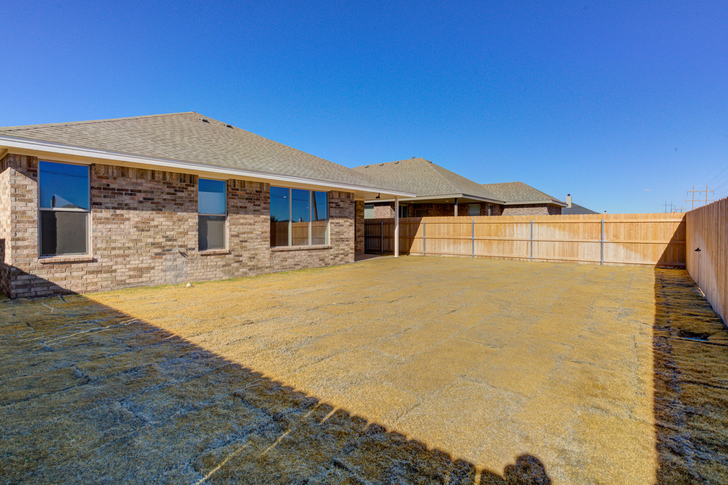1005 Quincy Avenue Lubbock, TX 79416 - Photo 46 of 46 a front view of a house with yard