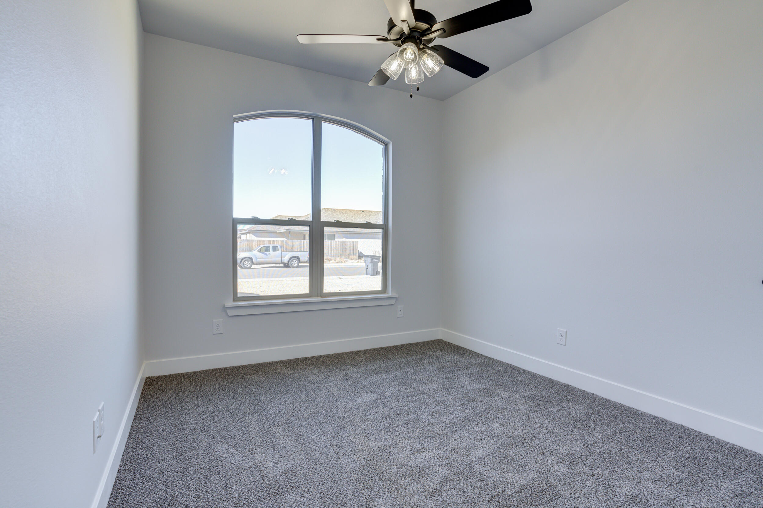 1005 Quincy Avenue Lubbock, TX 79416 - Photo 8 of 46 an empty room with a window