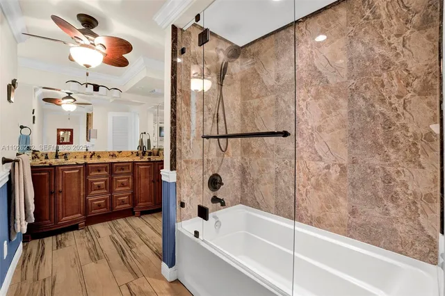 a bathroom with a bathtub and a shower