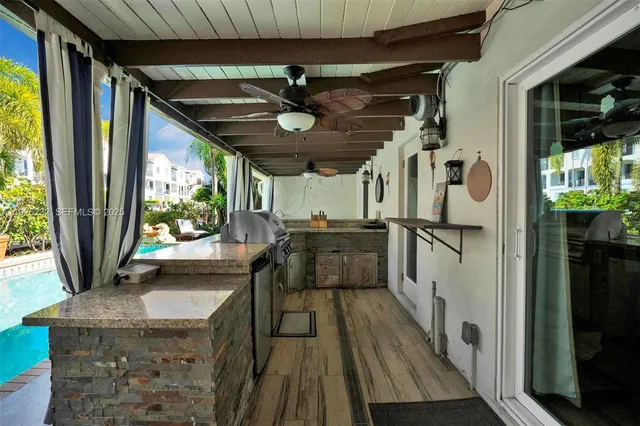 a view of a porch with furniture