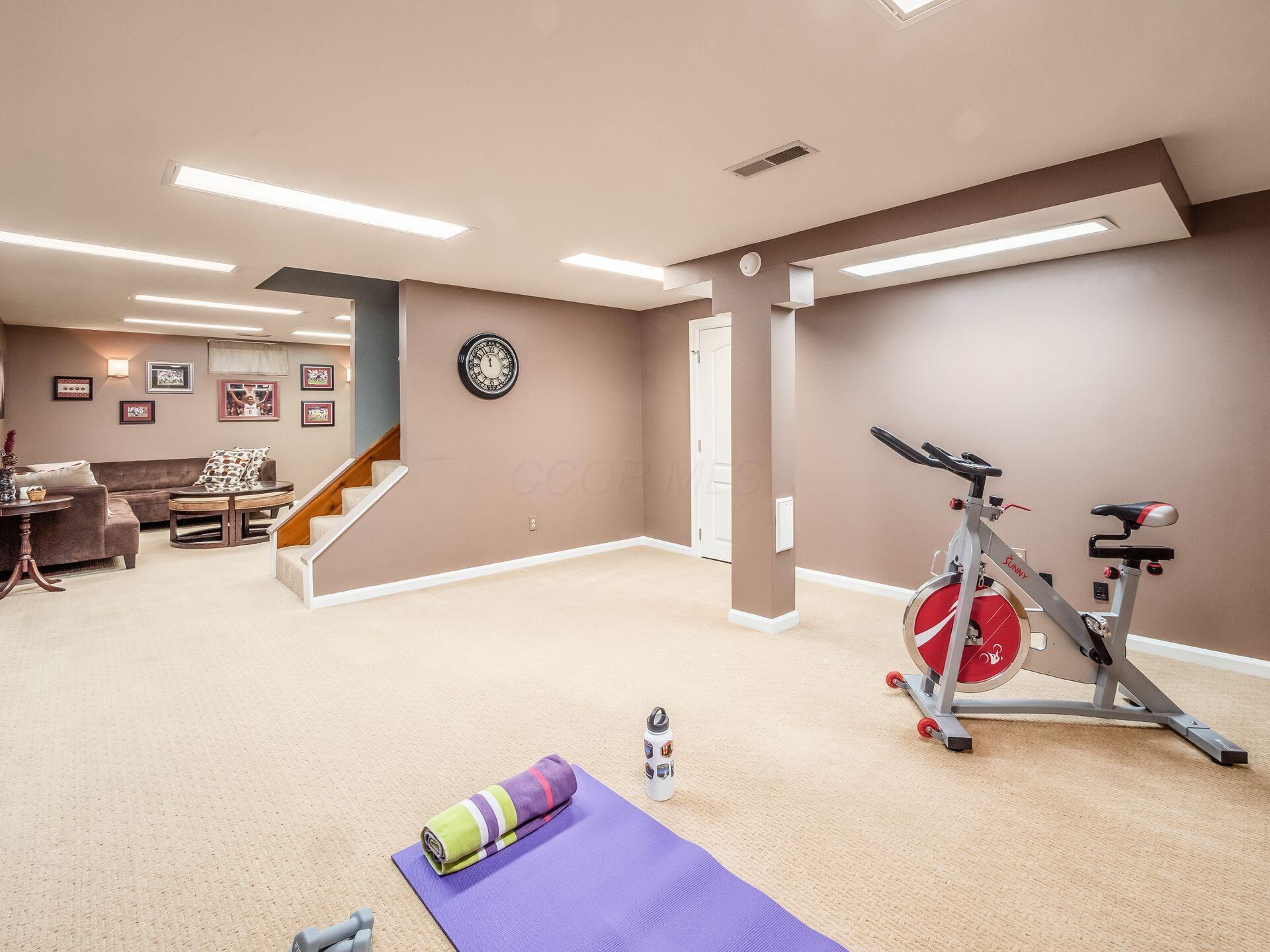 7056 Fitzgerald Road Dublin, OH 43017 - Photo 25 of 52 Finished Basement