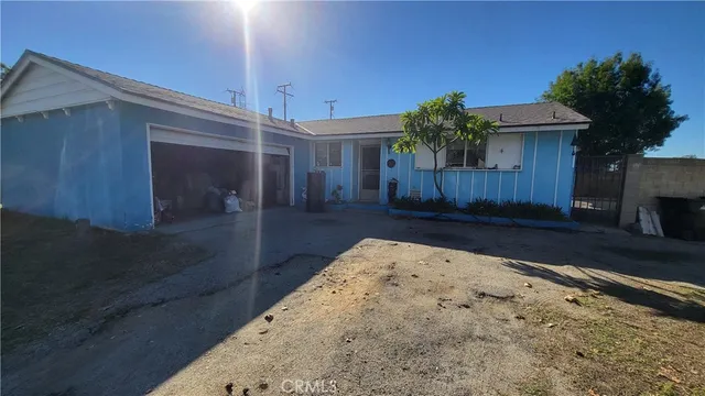 a view of a street with a building in the background