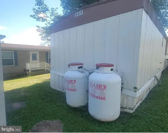 a view of a back yard of the house