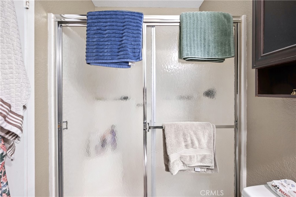 47800 Madison Street, Unit 174 Indio, CA 92201 - Photo 14 of 24 a bathroom with a shower