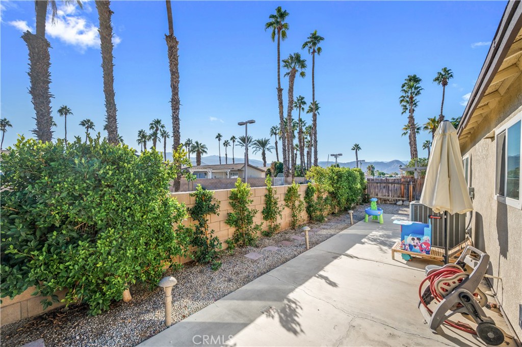 47800 Madison Street, Unit 174 Indio, CA 92201 - Photo 18 of 24 a view of a terrace with sitting area