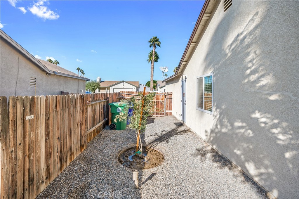 47800 Madison Street, Unit 174 Indio, CA 92201 - Photo 19 of 24 a view of a porch with furniture
