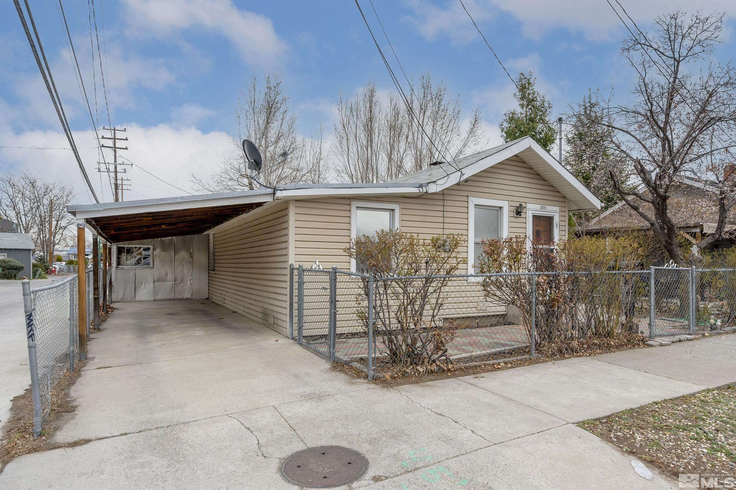 1078 Haskell Street Reno, NV 89509 - Photo 1 of 15 a view of a house with a pathway