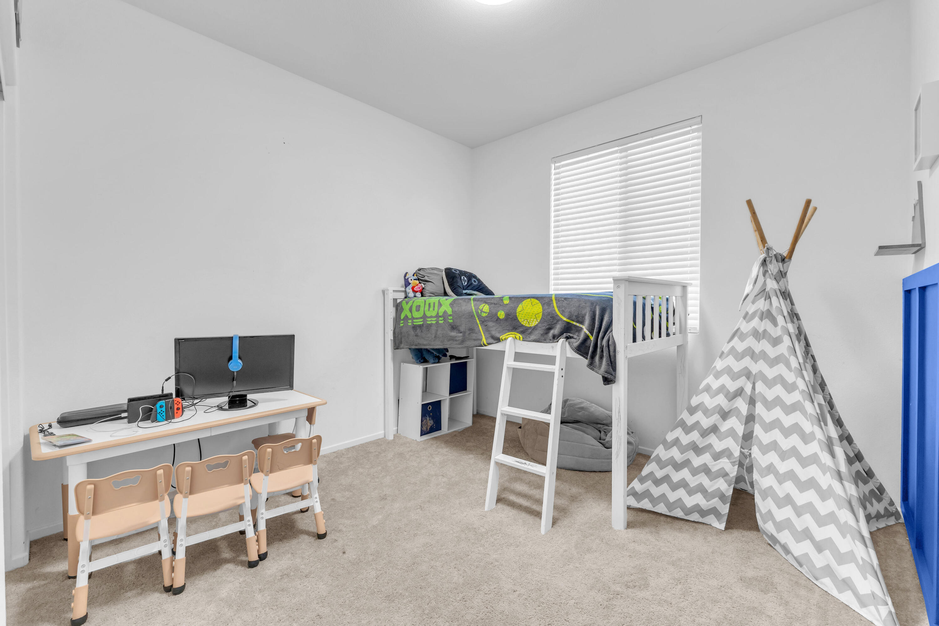 53020 Torino Place Coachella, CA 92236 - Photo 30 of 43 a view of a workspace with furniture and a window