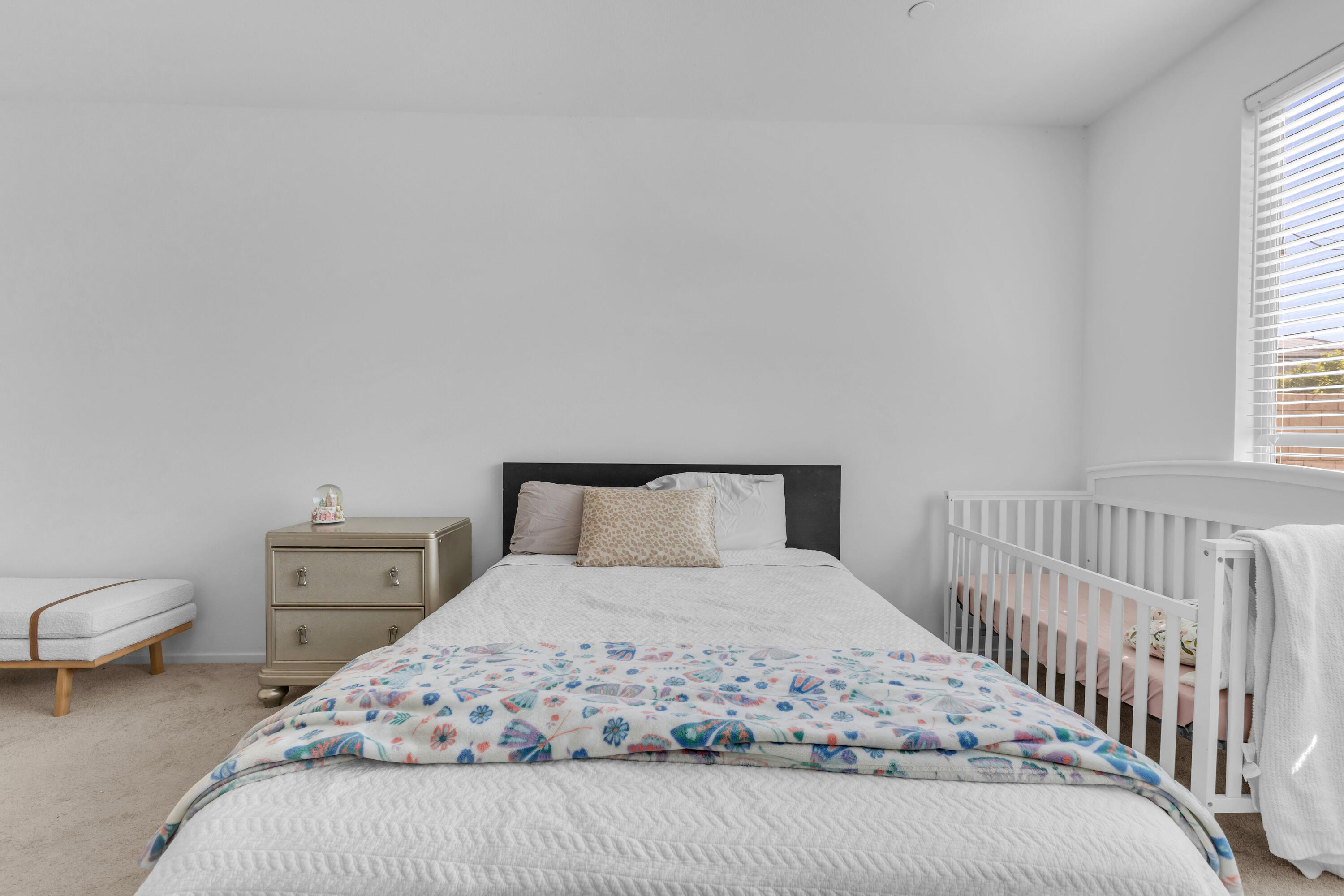 53020 Torino Place Coachella, CA 92236 - Photo 31 of 43 a bedroom with a bed and a lamp with window
