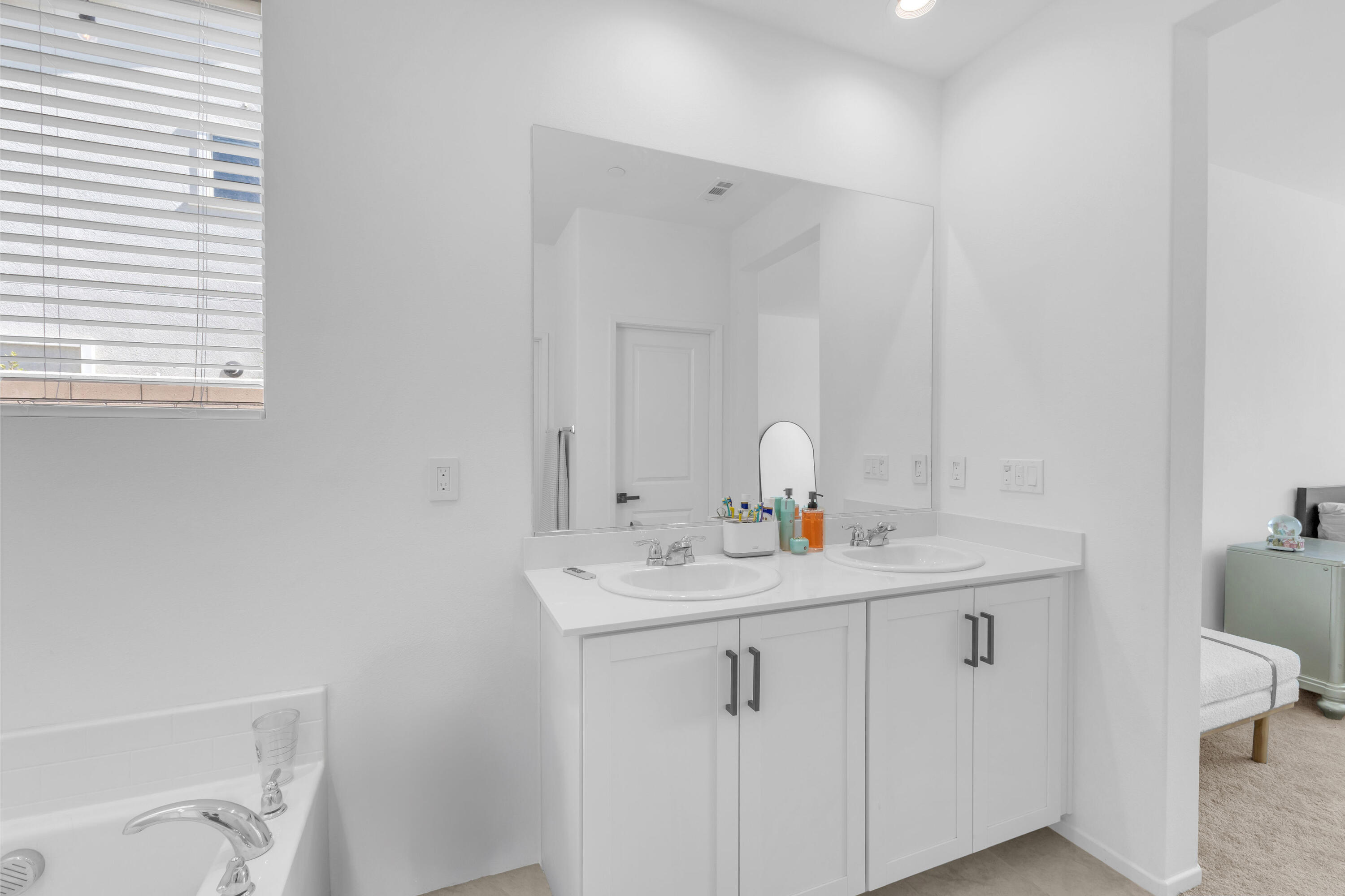 53020 Torino Place Coachella, CA 92236 - Photo 34 of 43 a bathroom with a sink a toilet and a mirror