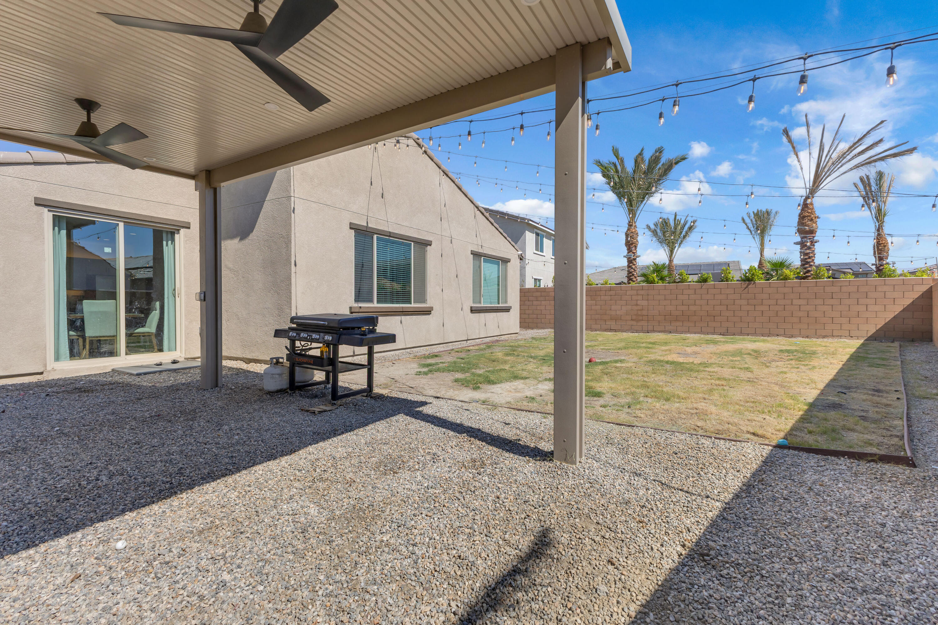 53020 Torino Place Coachella, CA 92236 - Photo 41 of 43 a view of a porch with furniture and a yard