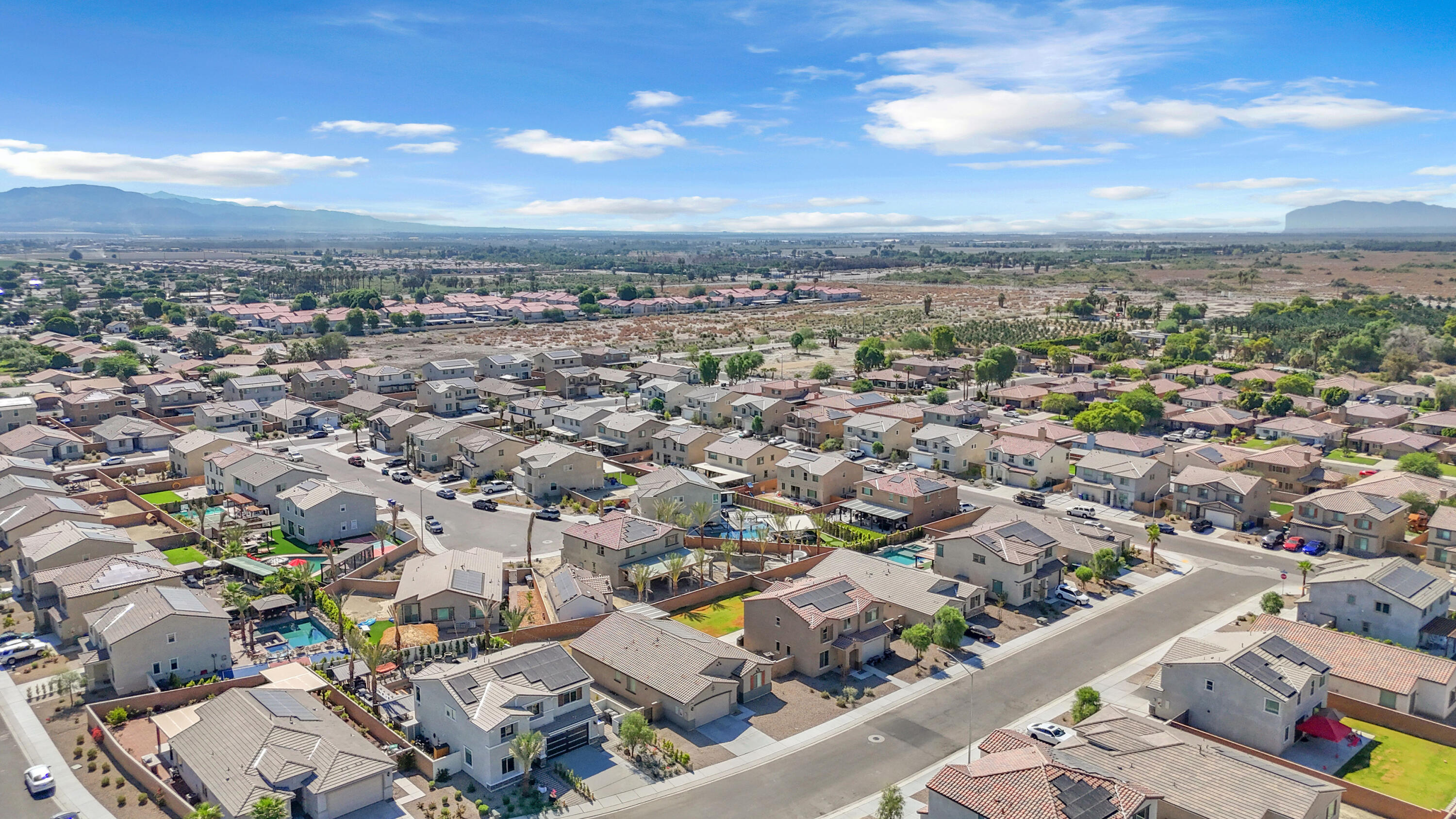 53020 Torino Place Coachella, CA 92236 - Photo 8 of 43 an aerial view of residential houses with city view
