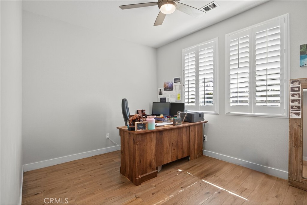 3459 North Oxnard Boulevard Oxnard, CA 93036 - Photo 17 of 54 a view of a workspace with furniture and a window