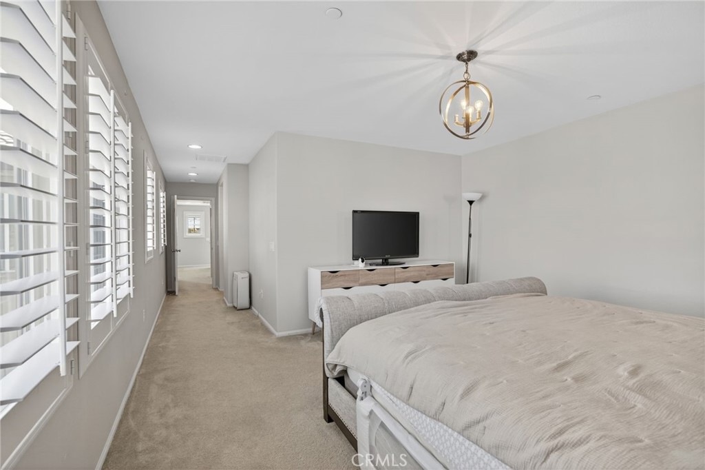 3459 North Oxnard Boulevard Oxnard, CA 93036 - Photo 23 of 54 a bedroom with bed and a tv