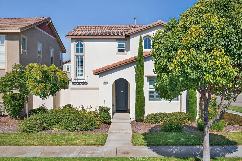3459 North Oxnard Boulevard Oxnard, CA 93036 - Photo 4 of 54 a front view of a house with garden