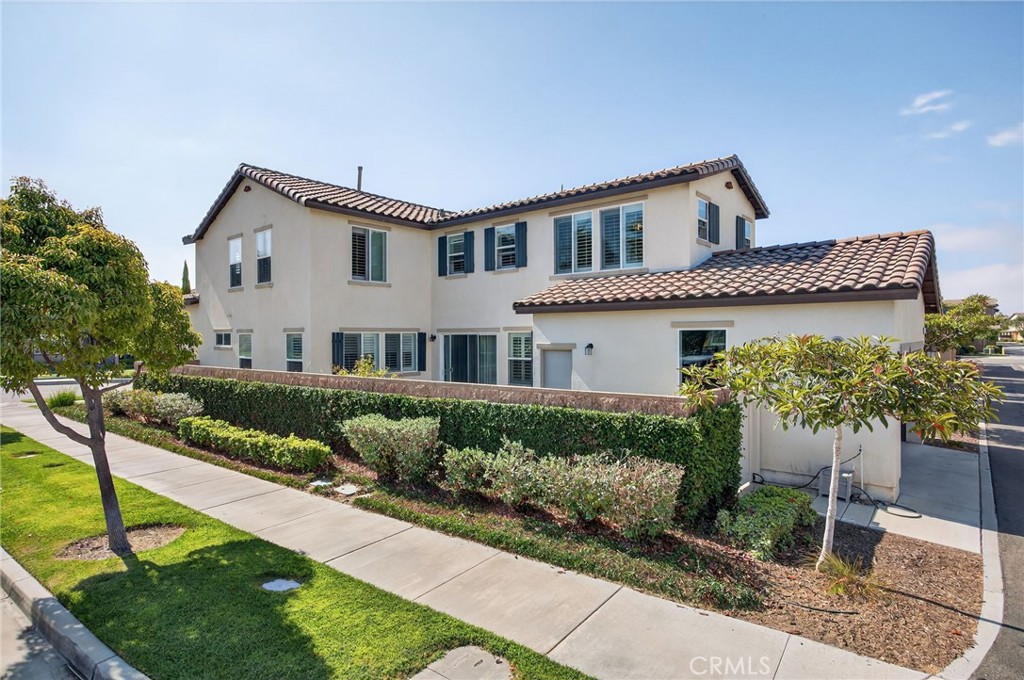 3459 North Oxnard Boulevard Oxnard, CA 93036 - Photo 42 of 54 a view of a house with a yard and potted plants