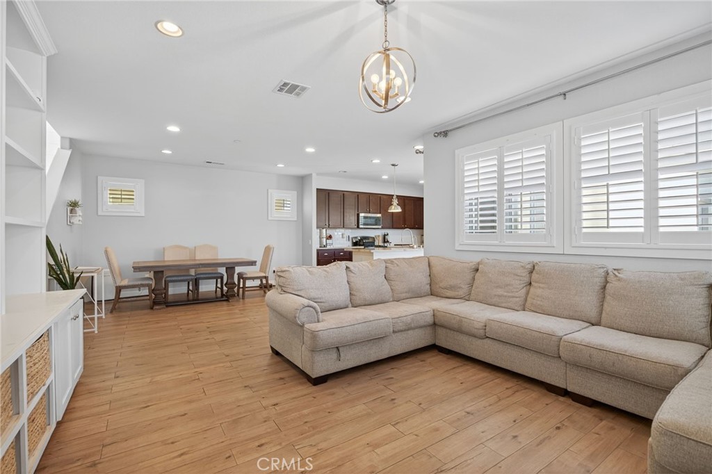 3459 North Oxnard Boulevard Oxnard, CA 93036 - Photo 8 of 54 a living room with furniture and a large window