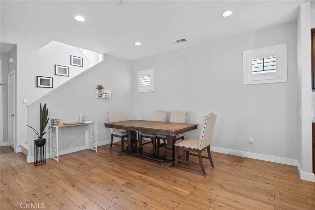 3459 North Oxnard Boulevard Oxnard, CA 93036 - Photo 10 of 54 a room with furniture and wooden floor