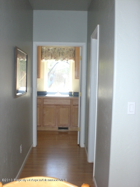 1235 Sage Court Rifle, CO 81650 - Photo 15 of 43 hall to laundry and garage