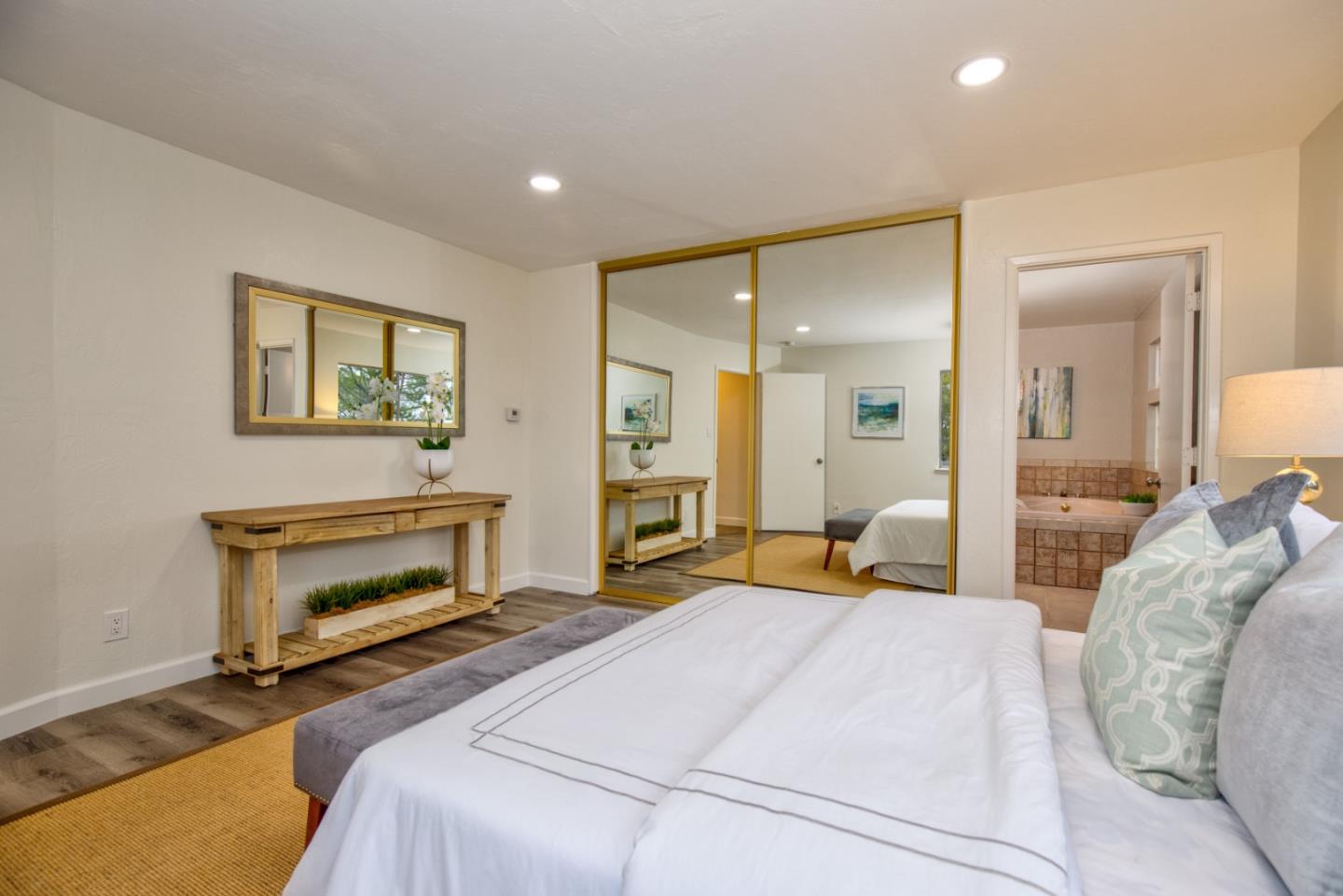 865 Sunset Drive San Carlos, CA 94070 - Photo 13 of 26 a bedroom with a bed and a couch