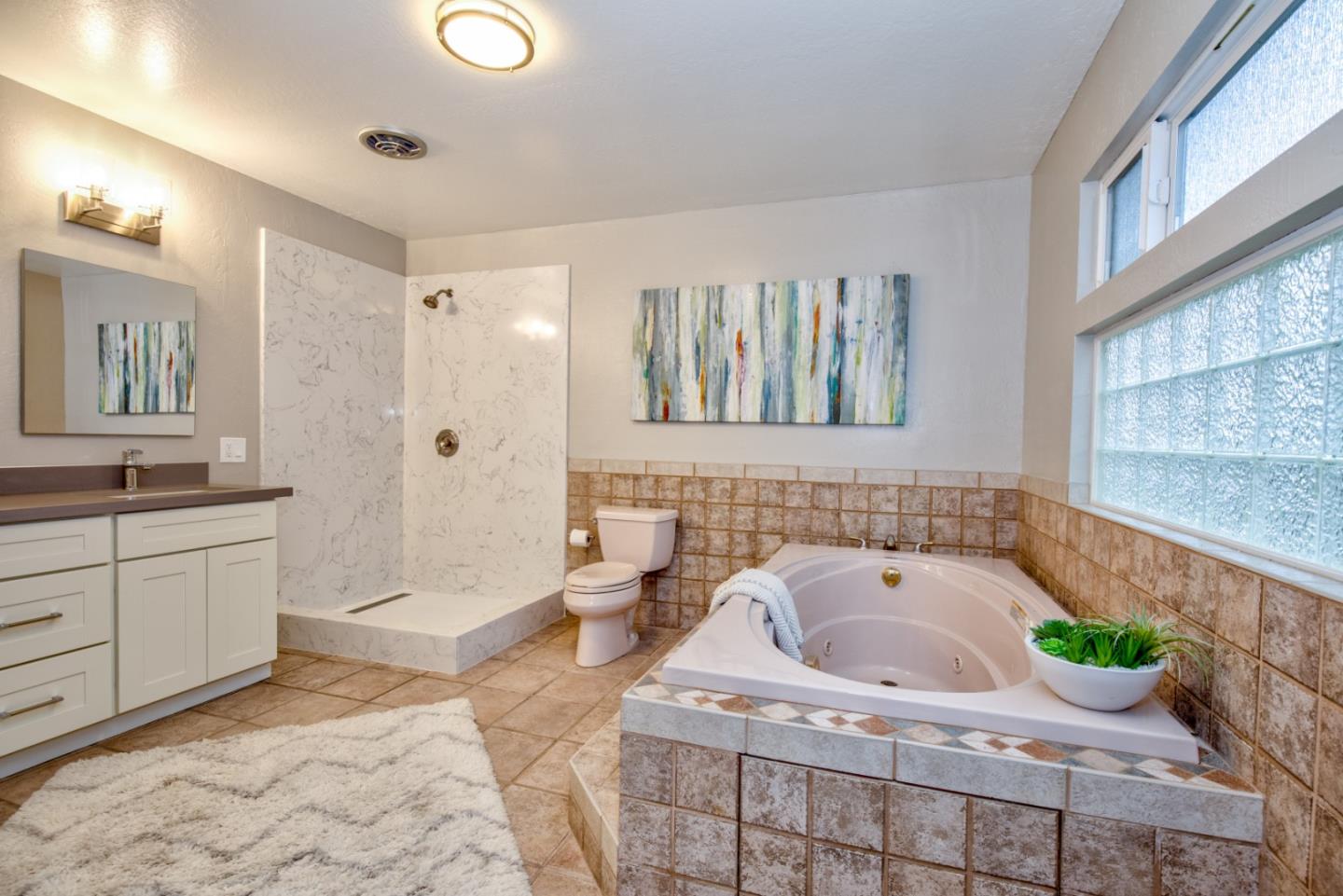 865 Sunset Drive San Carlos, CA 94070 - Photo 14 of 26 a bathroom with a sink a bathtub and a shower
