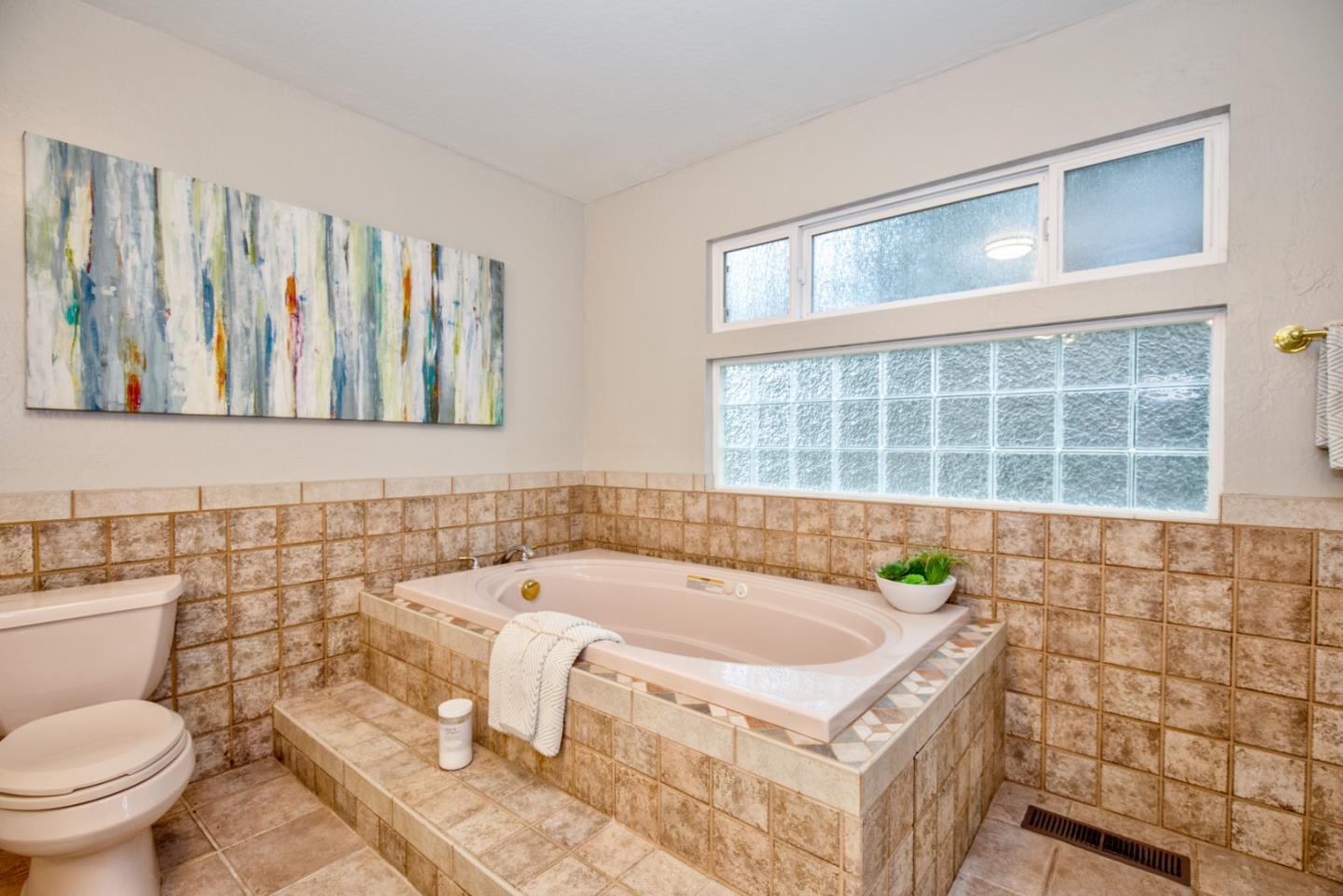 865 Sunset Drive San Carlos, CA 94070 - Photo 16 of 26 a bathroom with a sink and a toilet