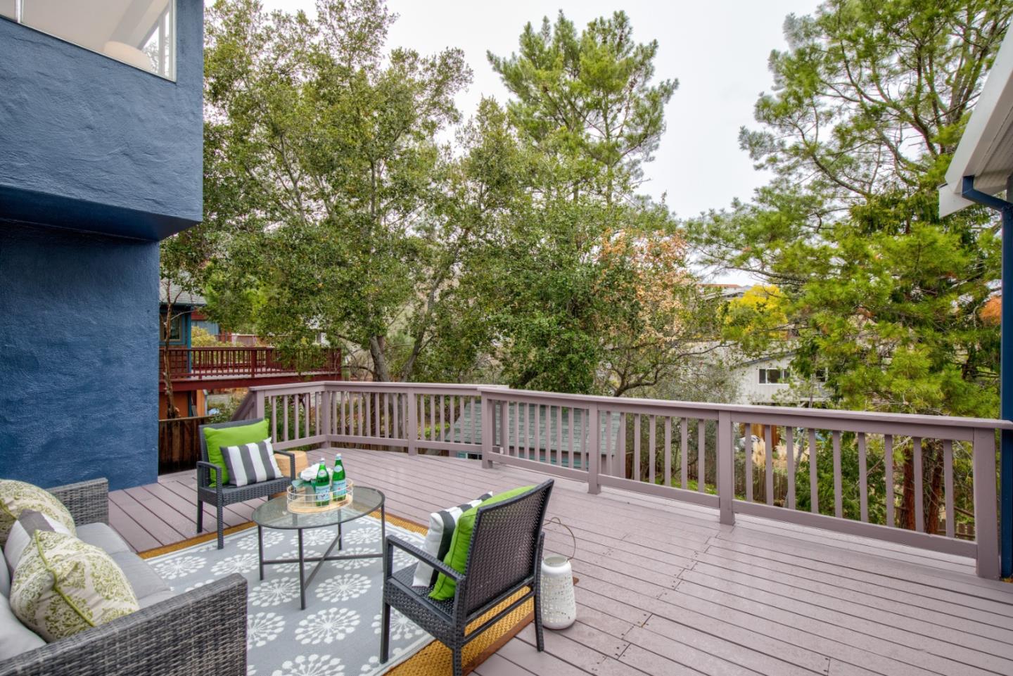 865 Sunset Drive San Carlos, CA 94070 - Photo 21 of 26 a balcony with wooden floor and furniture