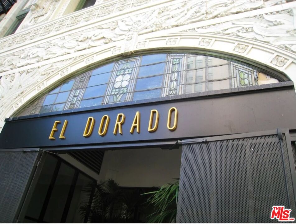 416 South Spring Street, Unit 905 Los Angeles, CA 90013 - Photo 15 of 19 a close up of a street sign