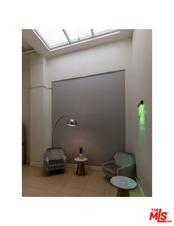 416 South Spring Street, Unit 905 Los Angeles, CA 90013 - Photo 3 of 19 a bathroom with a sink and a toilet