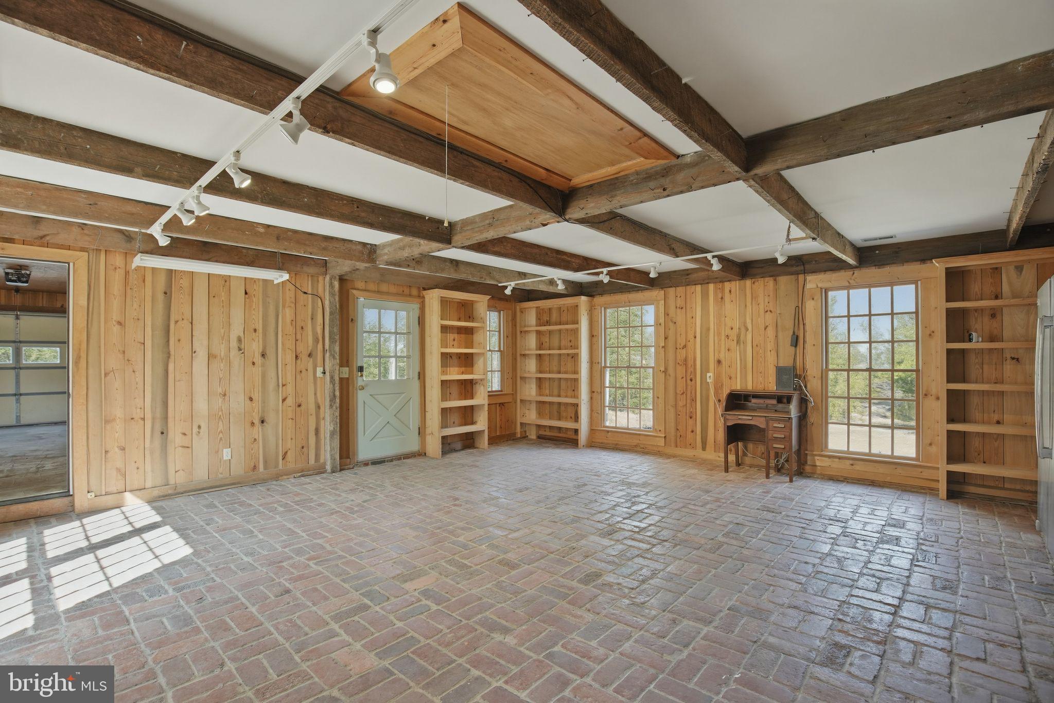 20045 Tower Hill Road Leonardtown, MD 20650 - Photo 26 of 65 Rec room, adjoins front loading 2 car garage.