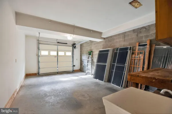 a bathroom with a bath tub with a shower