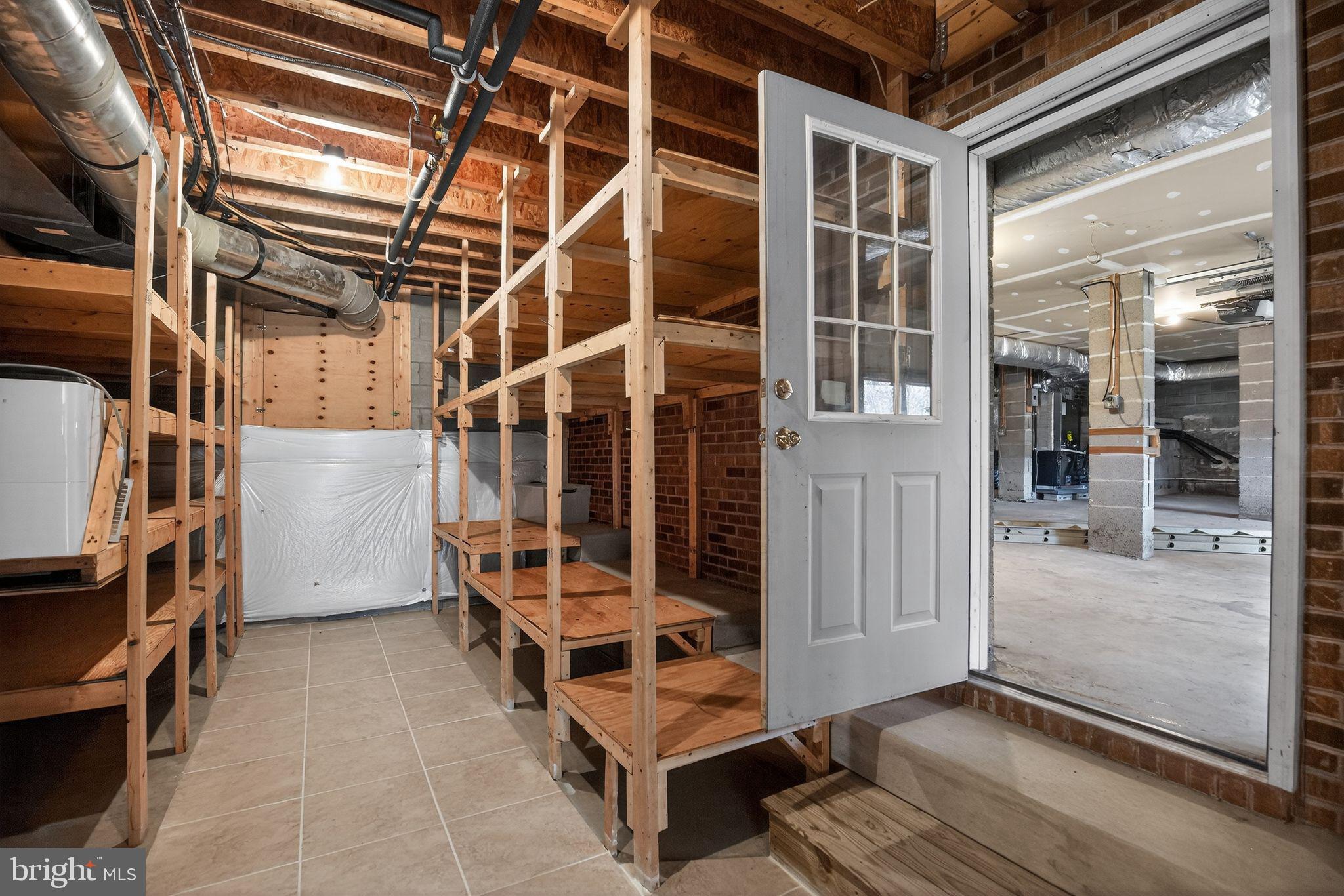 20045 Tower Hill Road Leonardtown, MD 20650 - Photo 40 of 65 Unfinished basement lux storage, lower 1.