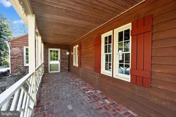 a view of a hallway with a chandelier