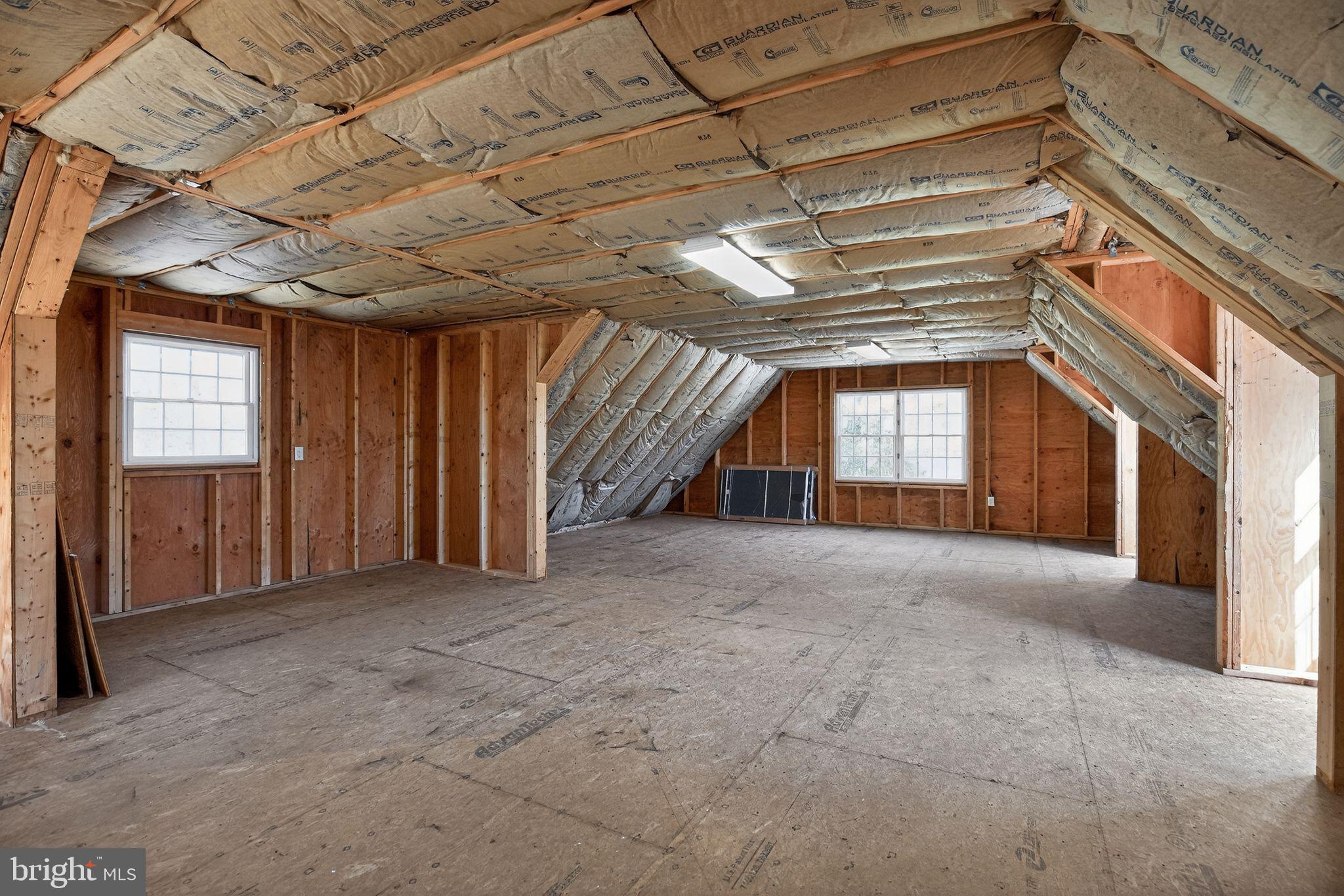 20045 Tower Hill Road Leonardtown, MD 20650 - Photo 58 of 65 Unfinished loft interior of 3 car detached garage