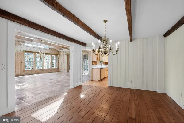 a view of an entryway with a floor to ceiling window