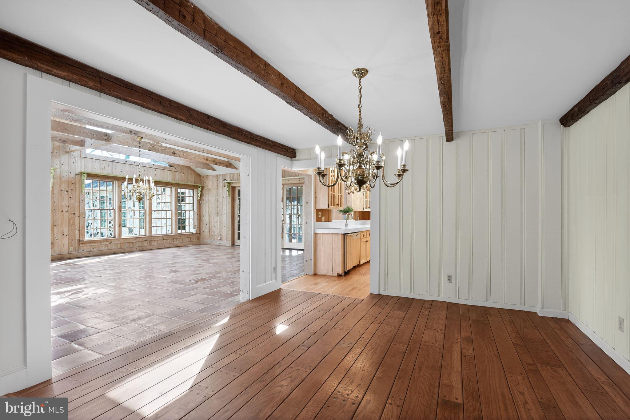 20045 Tower Hill Road Leonardtown, MD 20650 - Photo 9 of 65 Formal dining room opens into great room.