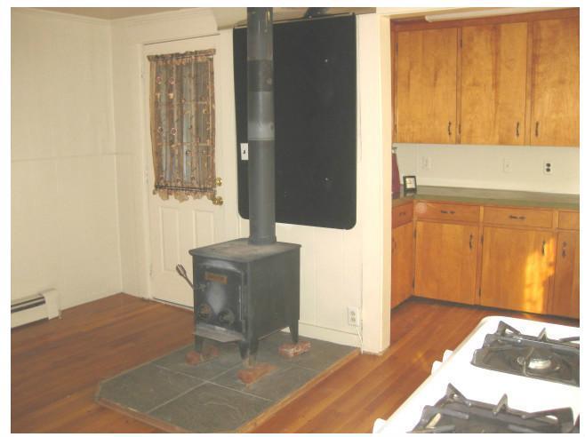 16 Winn Road Winn, ME 04495 - Photo 13 of 35 Kitchen. Door from the entry way...