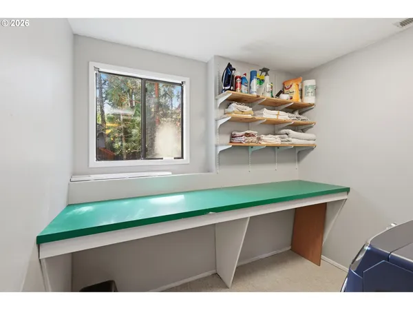 a view of kitchen and utility room
