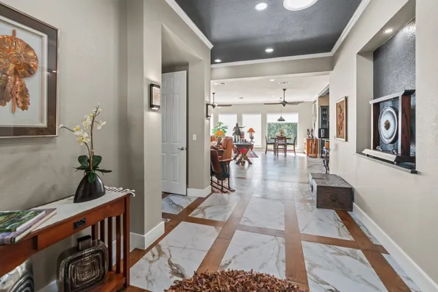 a living room with furniture and a table