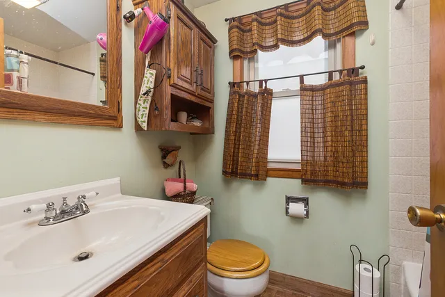a bathroom with a sink and a toilet