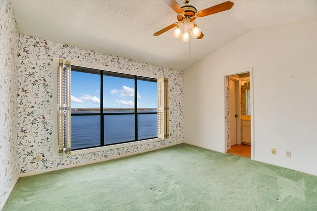 a bathroom with a shower and a sink