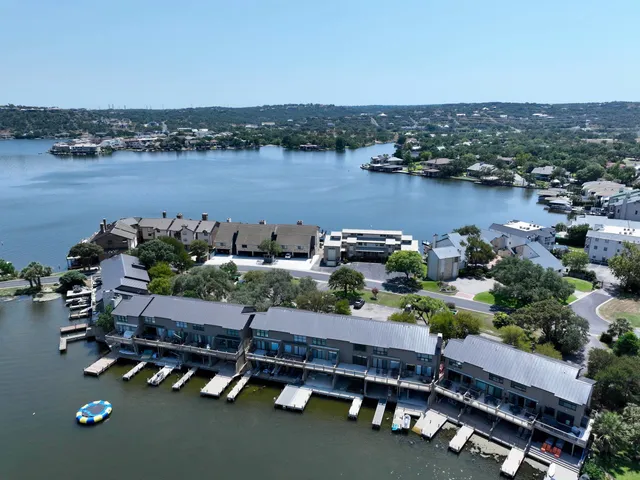 an aerial view of a houses with outdoor space