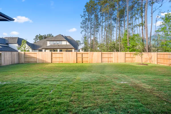 a view of a backyard with a garden