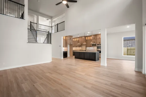 a view of a kitchen with a sink and a microwave