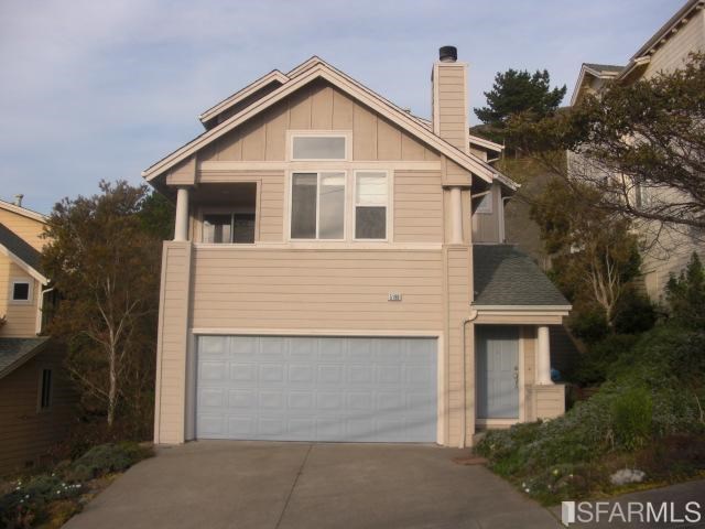 519 B Monterey Road Pacifica, CA 94044 - Photo 1 of 10 a view of a house with a yard and garage
